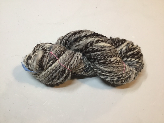 Auspicious Stitch - Handspun black Welsh Mountain, Shetland and Cheviot wool with added hand-dyed curly locks - 60g